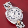 Cartier Clé de Cartier automatic watch with two-tone stainless steel and rose gold bracelet, white dial with Roman numerals a