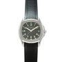 Stainless steel watch with dark dial, Arabic numerals, and black rubber strap with grid pattern.