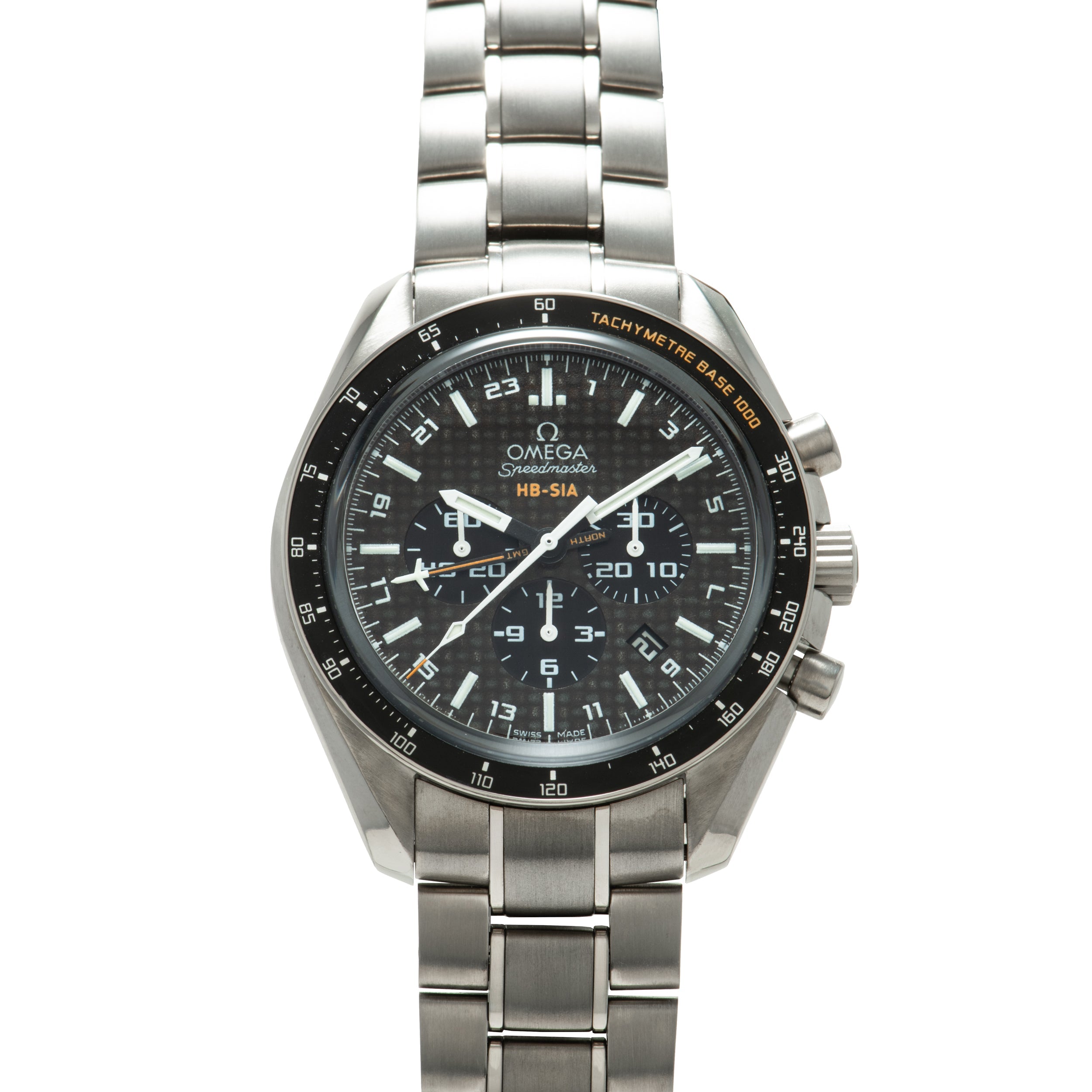 Omega Speedmaster chronograph watch with black dial, tachymeter bezel, and titanium metal bracelet.