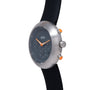 Ikepod Chronopod watch with brushed silver case, black dial, orange hands and pushers, black rubber strap.