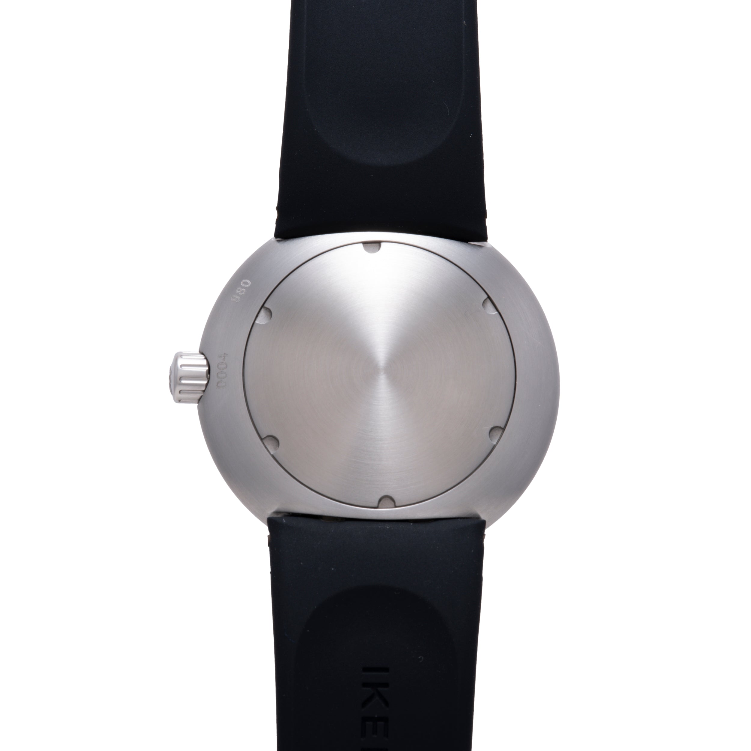 Silver-toned spherical watch with brushed metal face, small dot markers, crown on side, and black rubber strap.