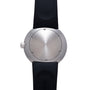 Silver-toned spherical watch with brushed metal face, small dot markers, crown on side, and black rubber strap.