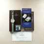 Patek Philippe Calatrava Pilot Travel Time watch with sage green strap, presentation box, museum catalog, and certificate of