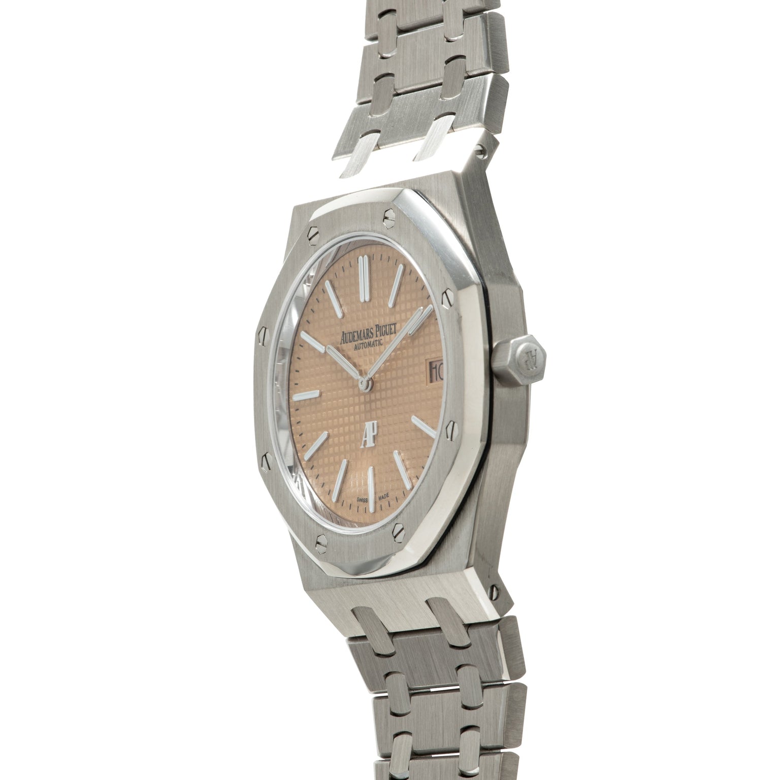 Stainless steel watch with octagonal case, salmon-colored dial, applied indices, and matching metal bracelet.