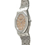Stainless steel watch with octagonal case, salmon-colored dial, applied indices, and matching metal bracelet.
