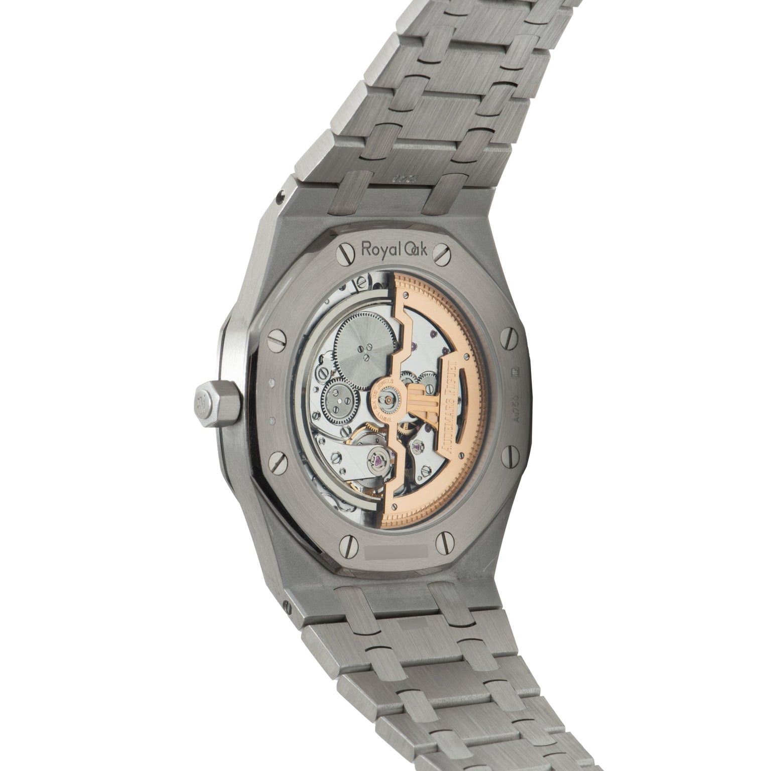 Stainless steel Royal Oak watch with exposed skeleton dial showing gold-toned mechanical movement and integrated metal bracel
