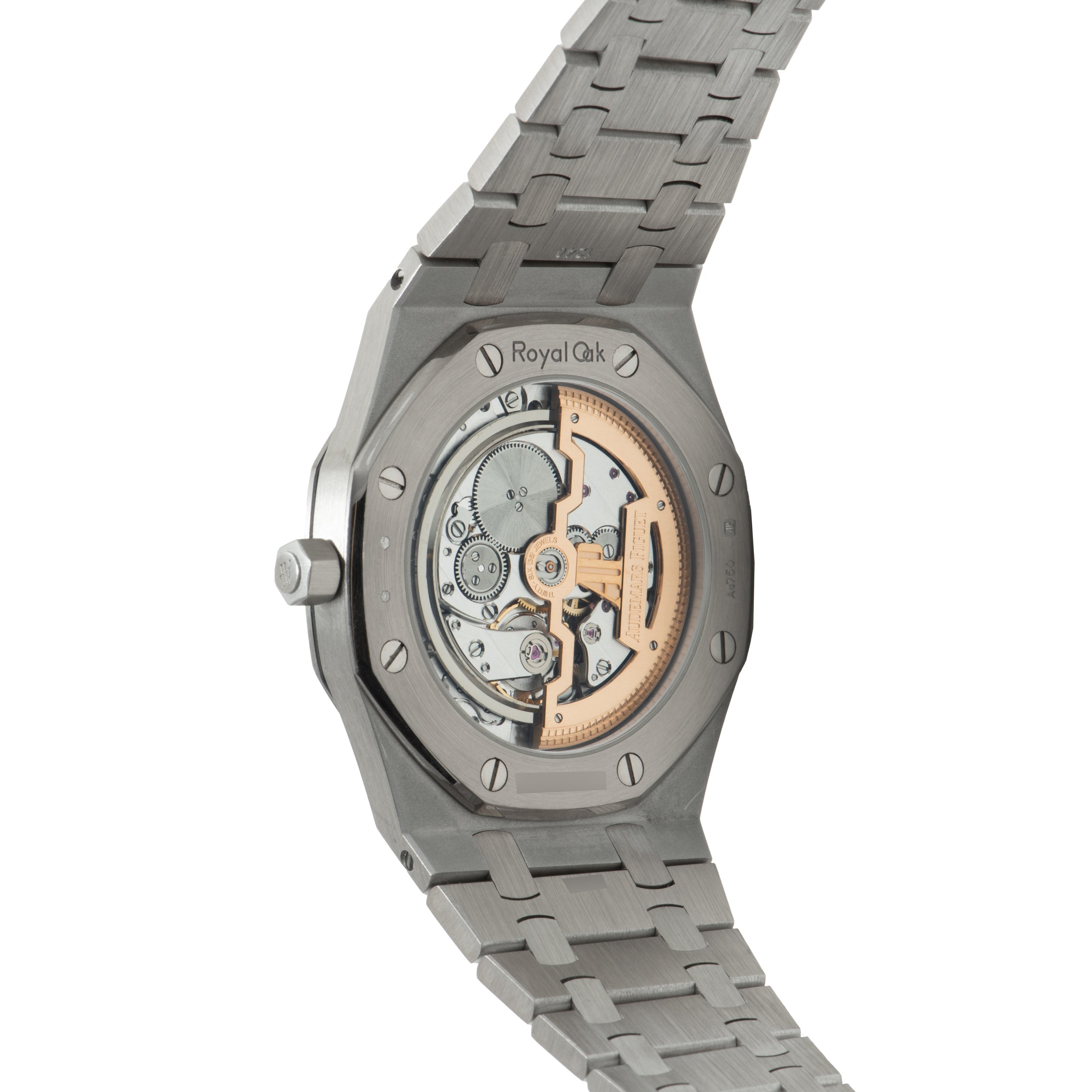 Stainless steel Royal Oak watch with exposed skeleton dial showing gold-toned mechanical movement and integrated metal bracel