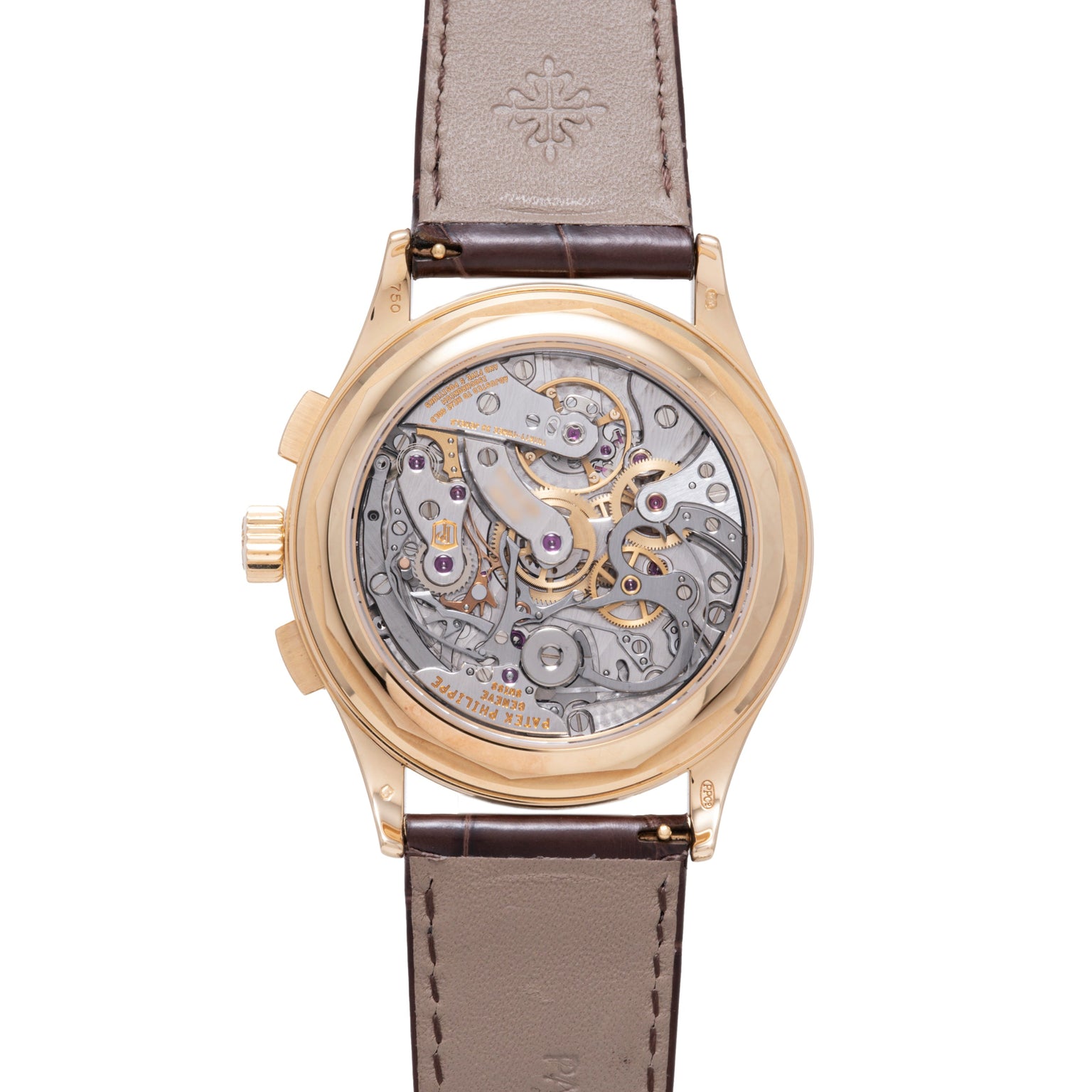 Gold-tone chronograph watch with visible skeletal movement, brown leather strap, and exhibition caseback.