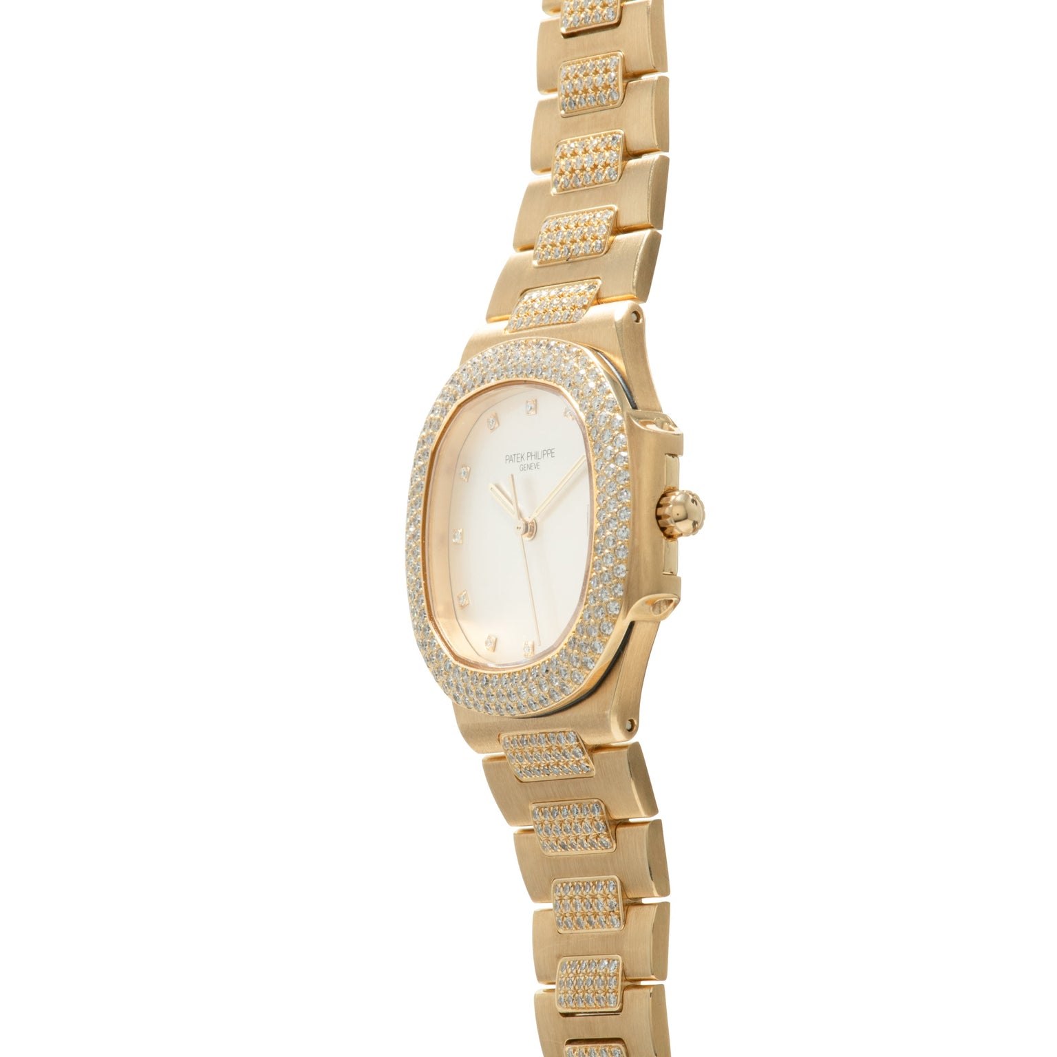 Gold-tone ladies watch with oval cream dial, diamond-set bezel and bracelet with rectangular links.