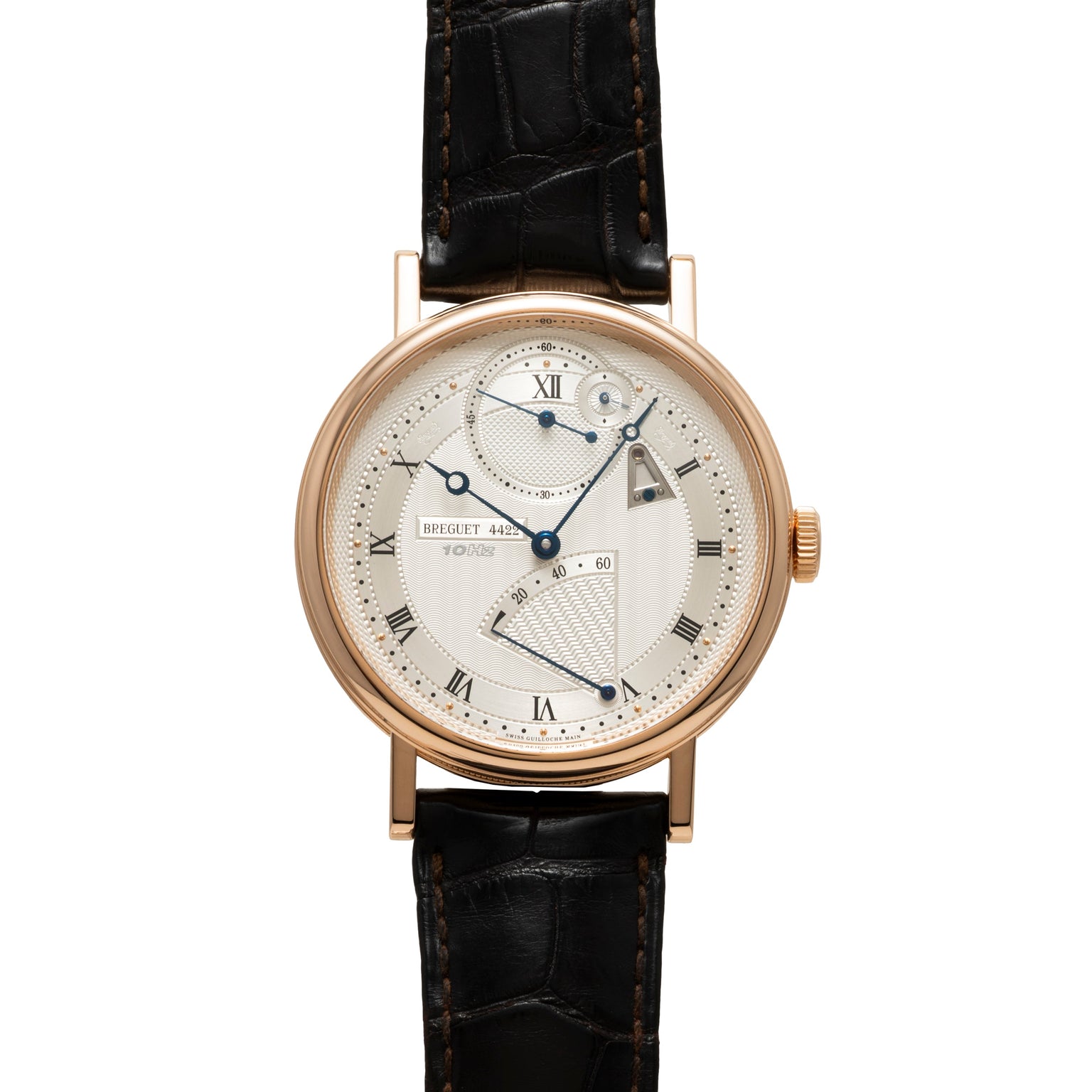 Rose gold round watch with cream dial, Roman numerals, and black crocodile leather strap.