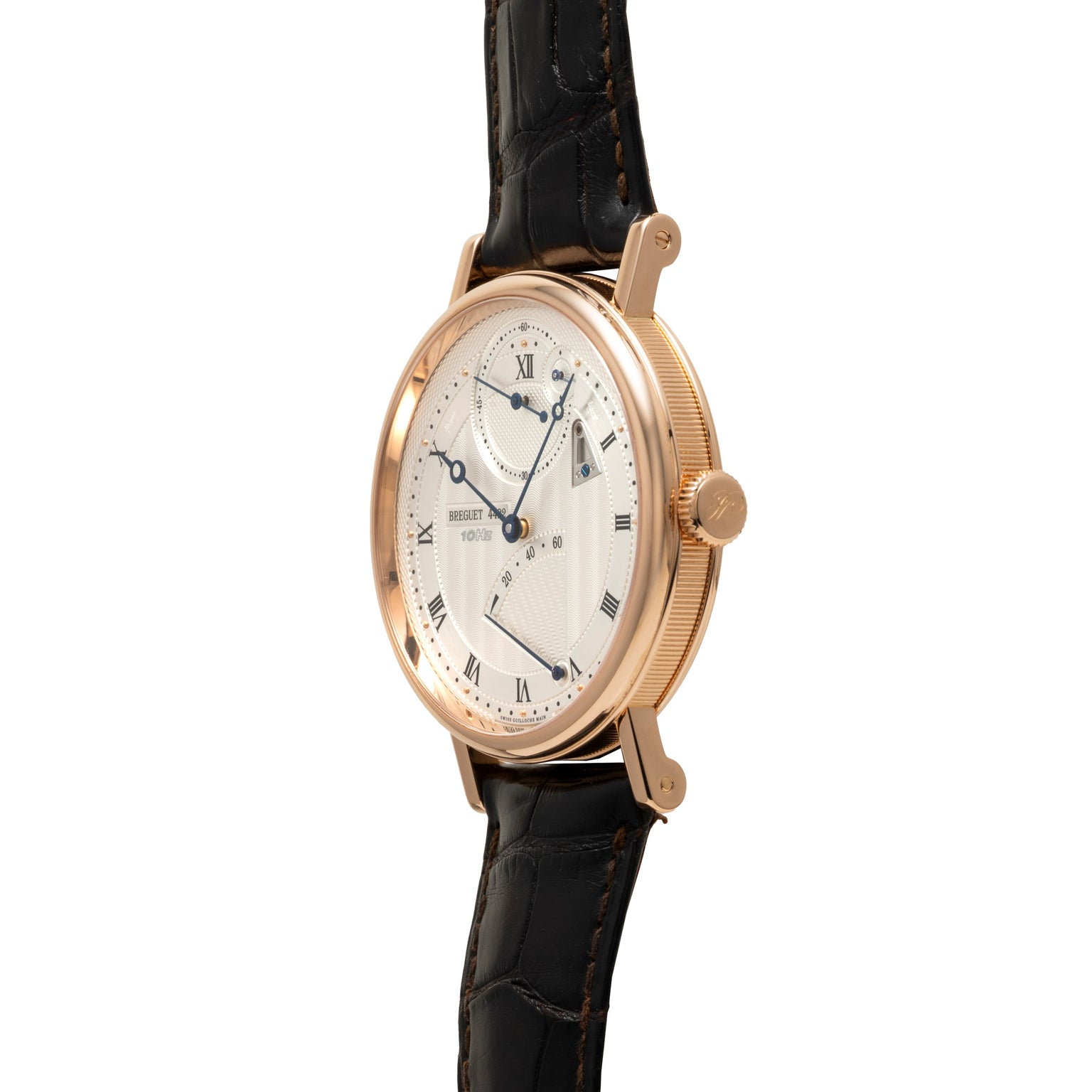 Rose gold watch with cream dial, Roman numerals, chronograph subdials, and black leather strap.