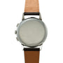 Stainless steel chronograph watch with blank silver dial, tan and black leather strap, and side pushers.