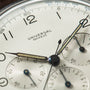 Universal Genève Jumbo Compax chronograph watch face with cream dial, three subdials, and steel hands.