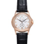 Rose gold watch with white dial, Arabic numerals, two subdials, and black leather strap.