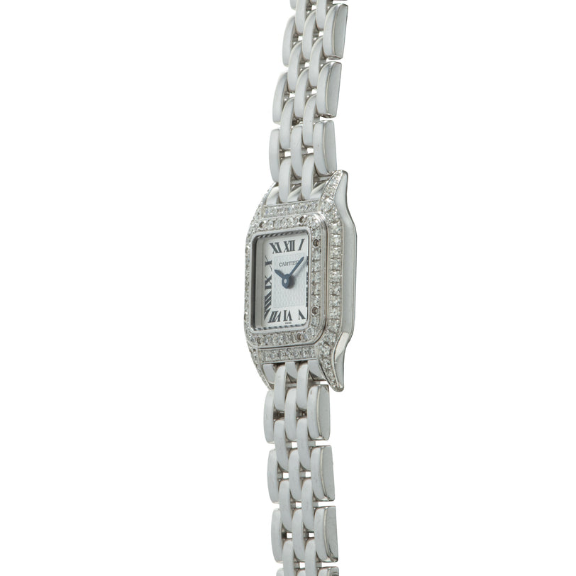 Silver-tone rectangular watch with diamond-set bezel, Roman numeral dial, and multi-link bracelet.
