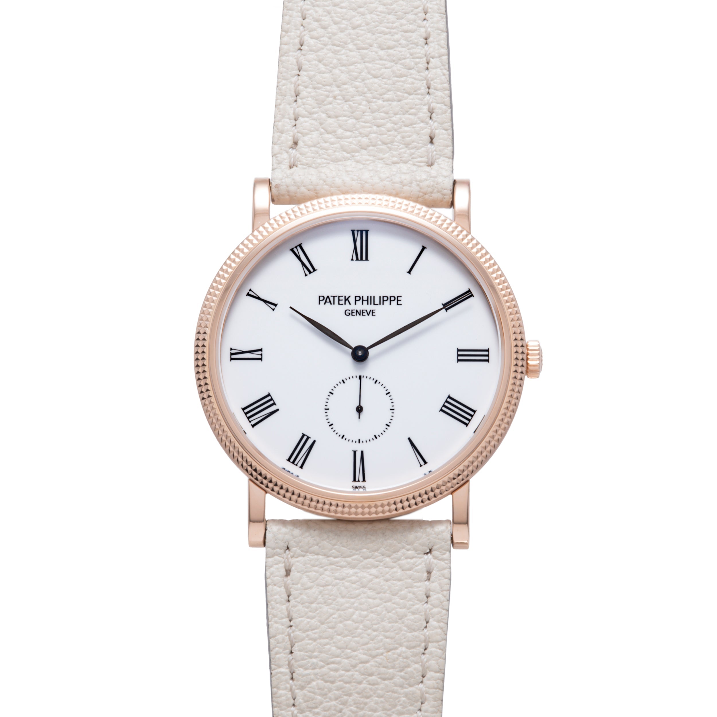 Rose gold watch with white dial, Roman numerals, subdial, and cream leather strap.