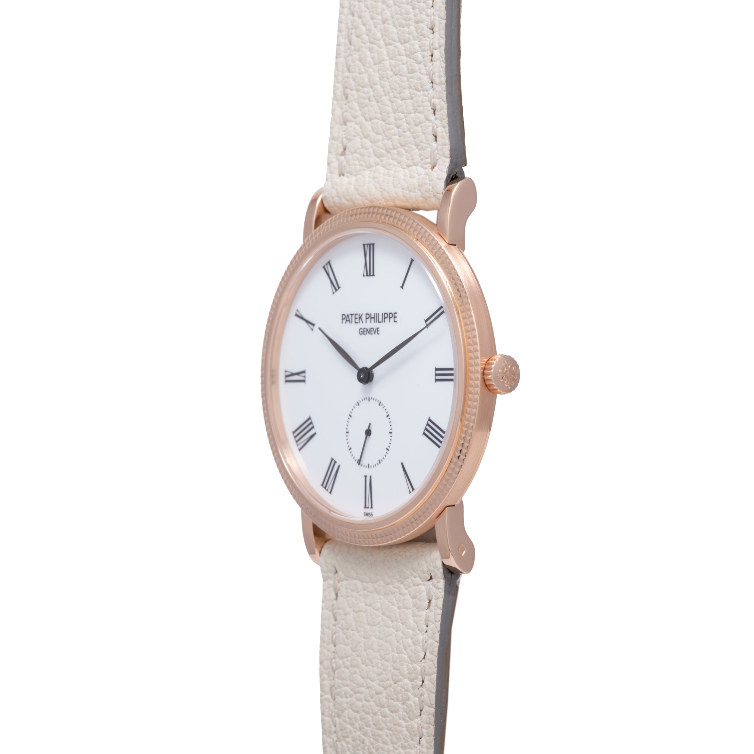 Rose gold oval watch with white dial, Roman numerals, subsidiary seconds dial, and cream leather strap.
