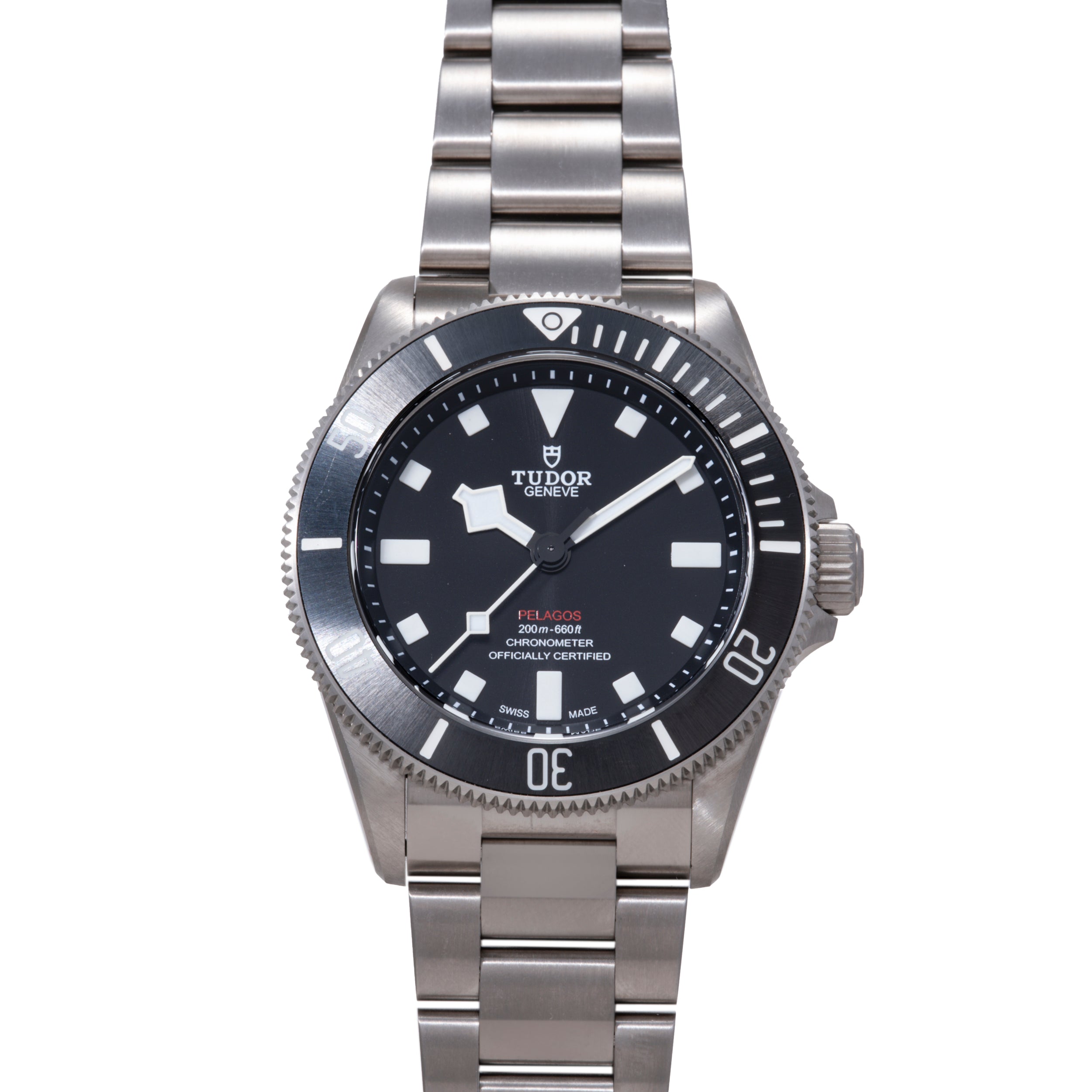 Tudor Pelagos 39 stainless steel diving watch with black dial, white square hour markers, and metal bracelet.