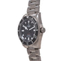 Tudor Pelagos 39 stainless steel dive watch with black dial, rotating bezel, and matching bracelet.