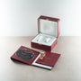 Cartier La Doña de Cartier rose gold ring displayed with burgundy box, DVD, and documentation.