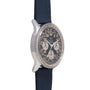 Breitling Cosmonaute chronograph watch with 24-hour dial, black face, white subdials, and dark blue fabric strap.