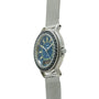 Stainless steel watch with blue dial, gold hour markers, rotating bezel, and mesh band.