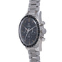 Omega Speedmaster chronograph watch with black dial, orange indices, stainless steel case and bracelet, tachymetre bezel.