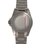 Titanium dive watch with link bracelet shown from the back, displaying brushed caseback with red stripe detail and engraved t