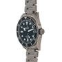 Stainless steel dive watch with black dial, white hour markers, rotating bezel, and matching bracelet.