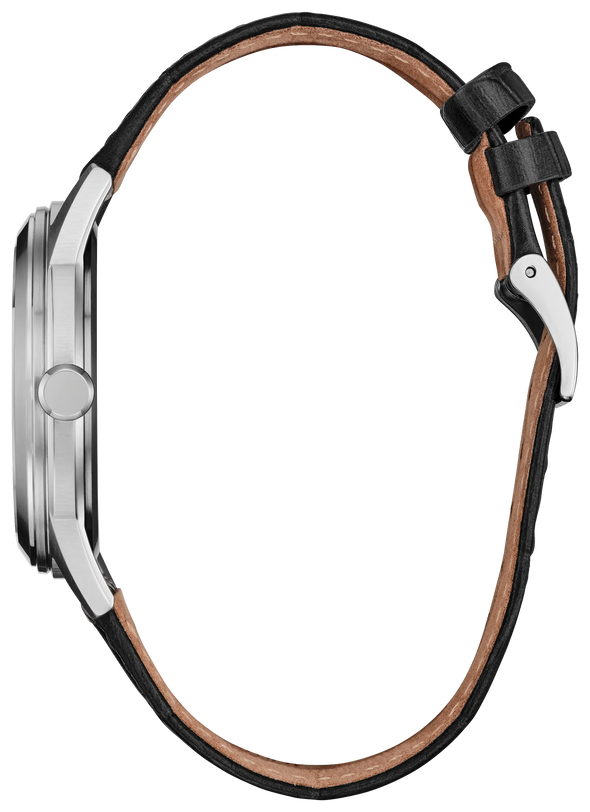 Black leather strap watch with silver-tone case and white dial, displayed from the side view.