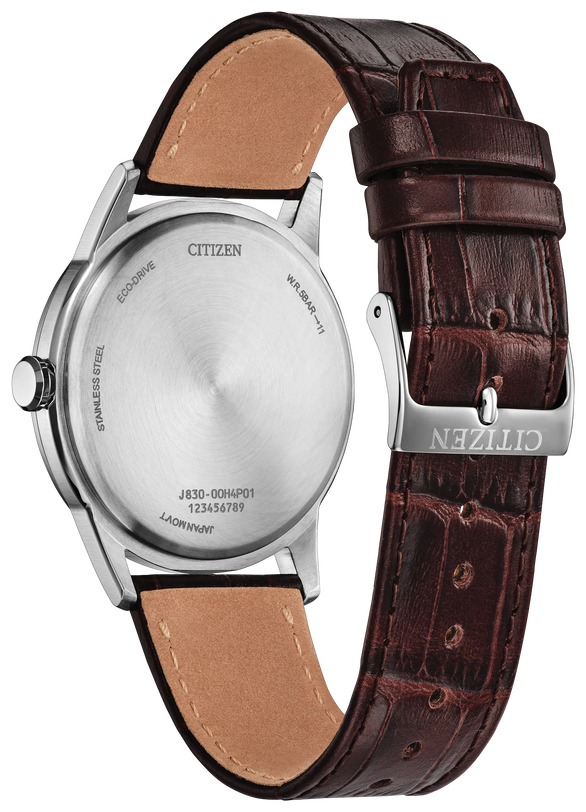 Citizen Eco-Drive watch with stainless steel case and dark brown leather crocodile-textured strap with tan suede interior.