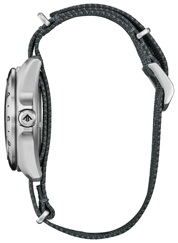 Navy nylon strap watch with stainless steel case and dial featuring centered logo, displayed from side profile.