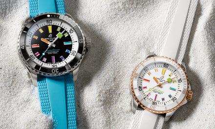 Two Breitling SuperOcean watches, one white and one blue