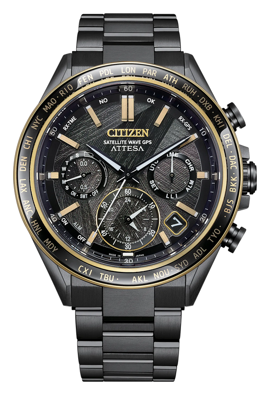 Black titanium 44mm chronograph watch with gold accents, black dial, multiple subdials, and matching bracelet.