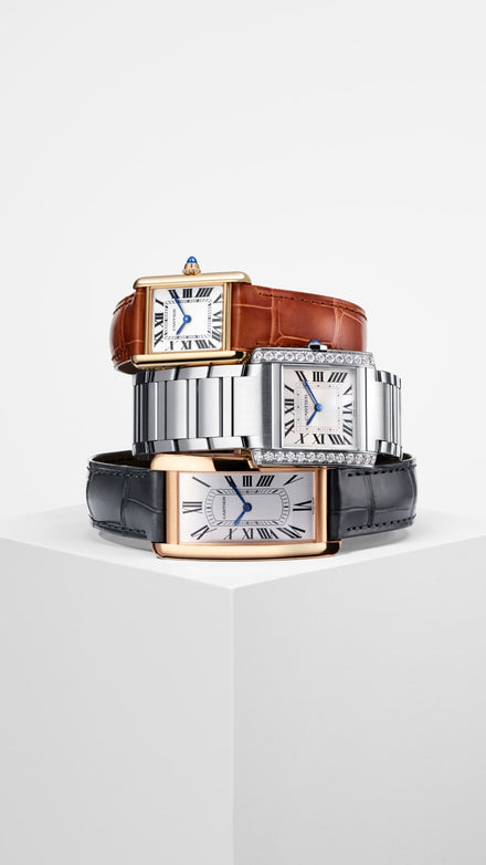 Stack of Cartier Tank watches 