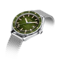 Wristwatch with green dial and silver mesh band on a white background