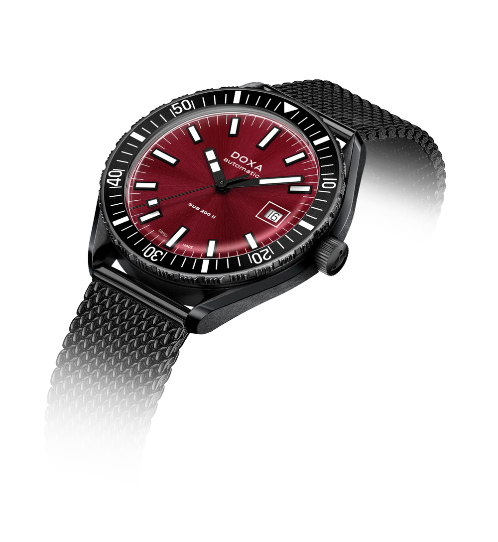 Watch with red dial and black strap on a white background