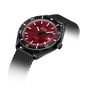 Watch with red dial and black strap on a white background