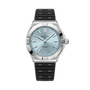 Stainless steel watch with light blue dial, applied hour markers, date window, and black rubber strap with silver accents.