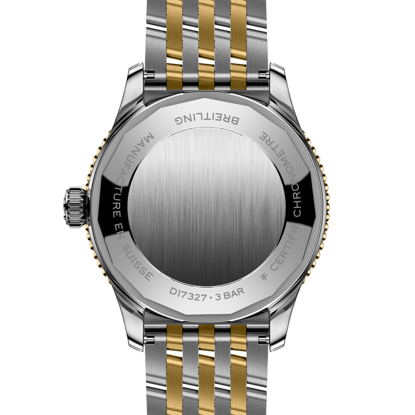 Steel and 18K yellow gold two-tone bracelet watch with brushed silver case back and rotating bezel.