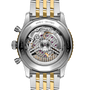Navitimer B01 chronograph watch with stainless steel and yellow gold two-tone bracelet, visible skeleton movement on caseback