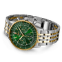 Navitimer B01 chronograph with green dial, yellow gold bezel, and stainless steel two-tone bracelet.