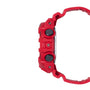 Red resin digital watch with multiple buttons and textured circular details on the side case.