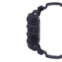 Gray resin digital watch with black band and textured buttons on side.