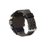 Mudmaster digital watch with black case, gray textured resin band, and multiple pushers on side.
