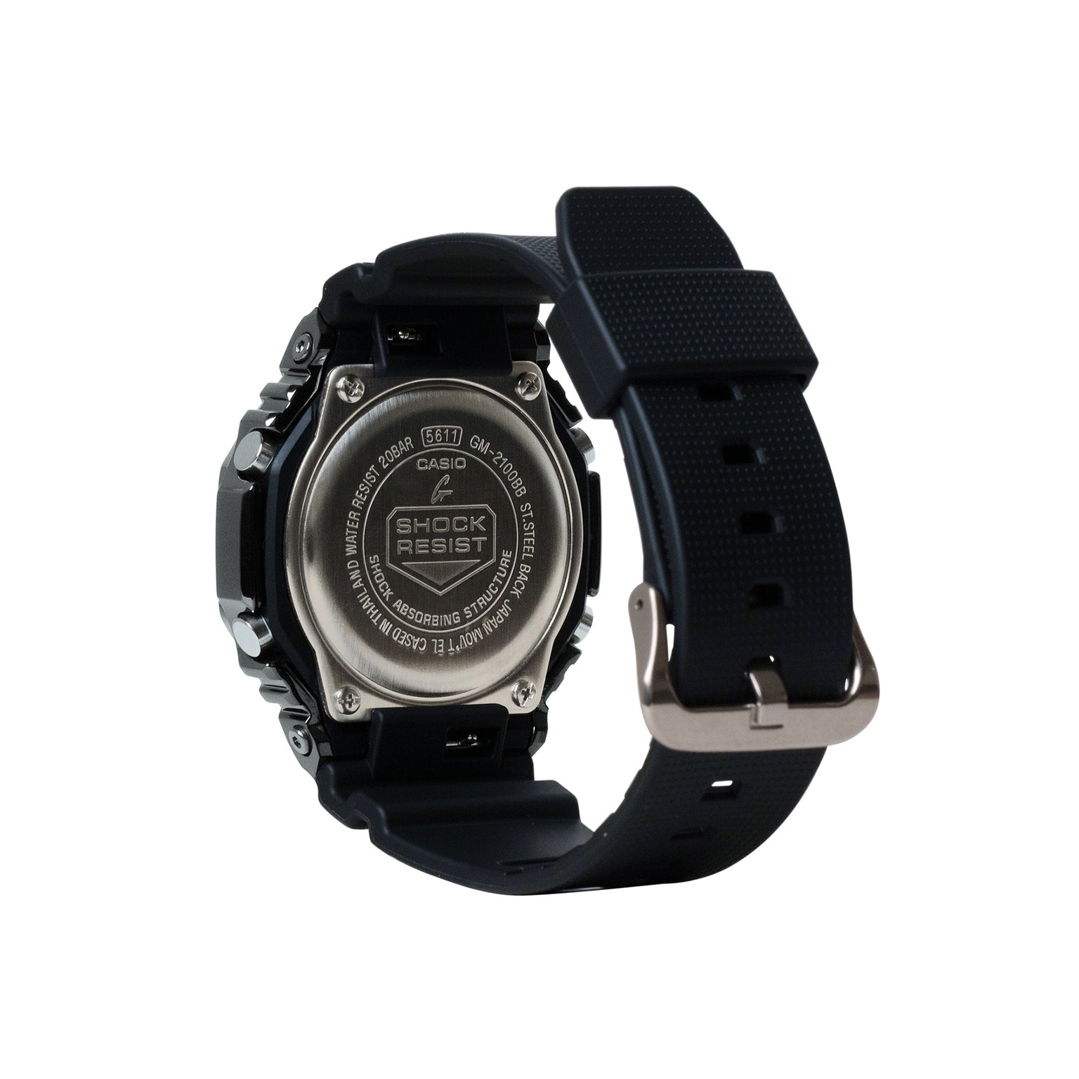Casio G-Shock digital watch with black resin band and stainless steel case back shown from rear angle.