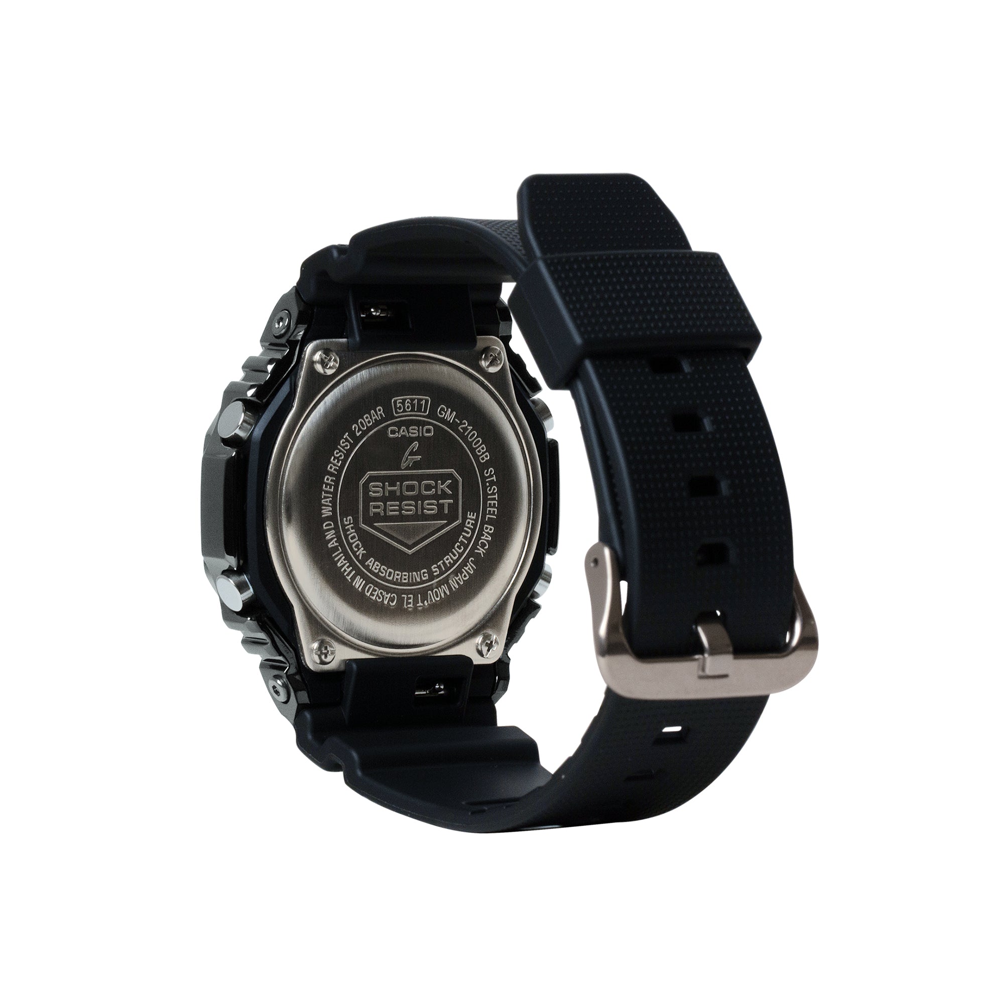 Casio G-Shock digital watch with black resin band and stainless steel case back shown from rear angle.