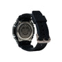 Black digital watch with stainless steel case, resin band, and metal buckle displayed from side angle.
