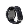 Black resin digital watch with square face, metal case back, and black band with metal buckle.