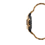 Gold and black digital watch with metal band and adjustable links, shown from the side view.